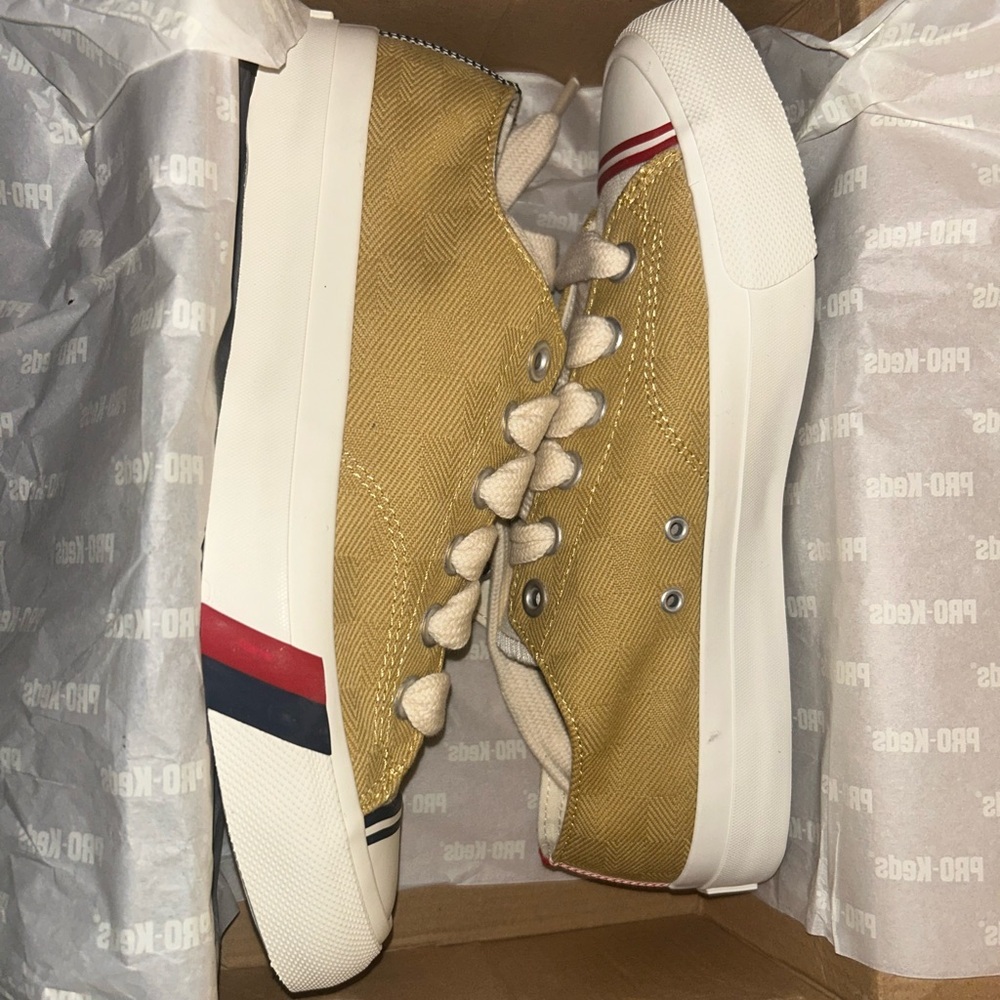 Yellow Sneakers with Red and Blue Accents